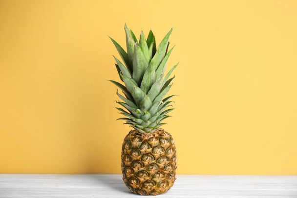 Fresh ripe juicy pineapple on white wooden table - 写真・画像