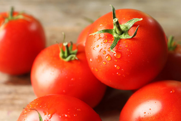 Fresh ripe tomatoes on wooden table, closeup - Φωτογραφία, εικόνα