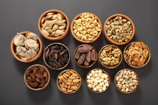 Dried fruits and mixed nuts. Healthy foods. - Photo, Image