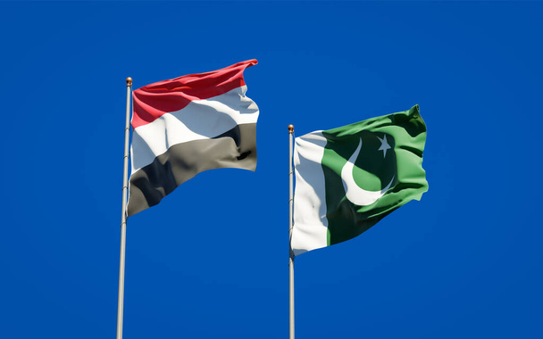 Gyönyörű nemzeti zászlók Jemen és Pakisztán együtt az ég hátterében. 3D-s művészeti koncepció.  - Fotó, kép