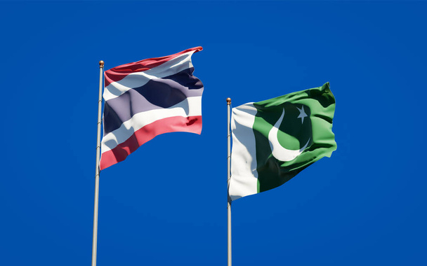 Prachtige nationale staatsvlaggen van Thailand en Pakistan samen op de achtergrond. 3D-kunstwerkconcept.  - Foto, afbeelding