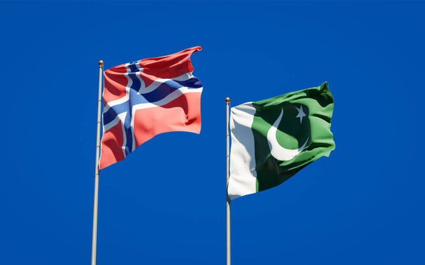 Beaux drapeaux nationaux de la Norvège et du Pakistan ensemble au fond du ciel. Concept d'illustration 3D.  - Photo, image