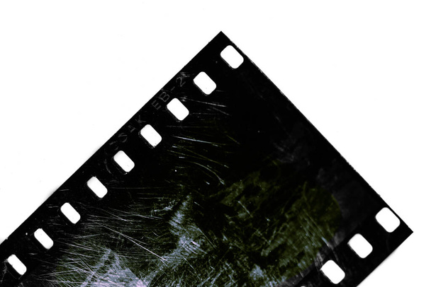 Detalhe do filme fotográfico para slides sobre fundo branco - Foto, Imagem