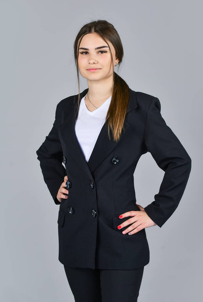 Girl wear black formal suit business outfit, college student concept - Fotó, kép