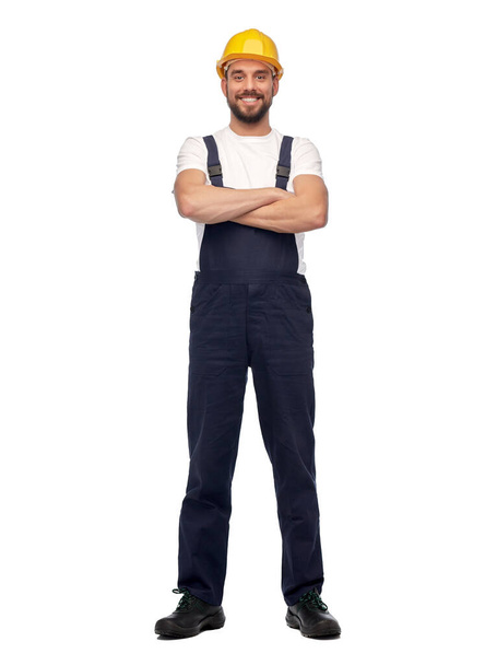 male worker or builder with crossed arms - Foto, imagen