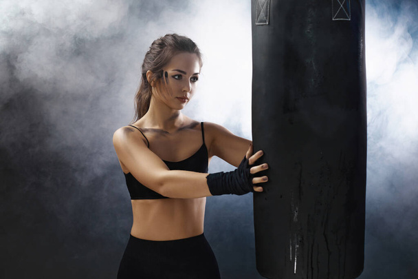 sporty brunette woman with boxing bandages - Fotoğraf, Görsel