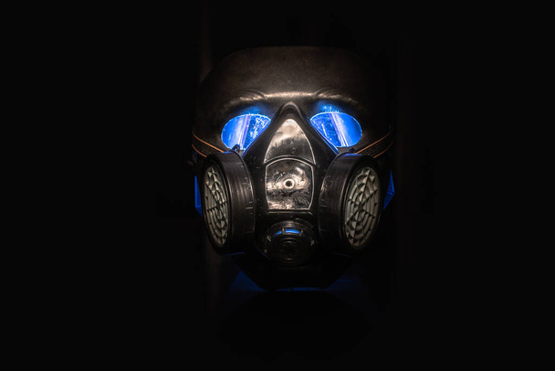 Metaphorical portrait of a creature in a respirator mask - 写真・画像