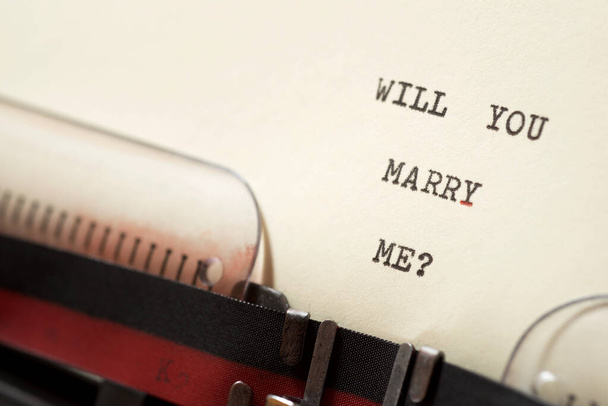 Will you marry me? phrase written with a typewriter. - Photo, Image