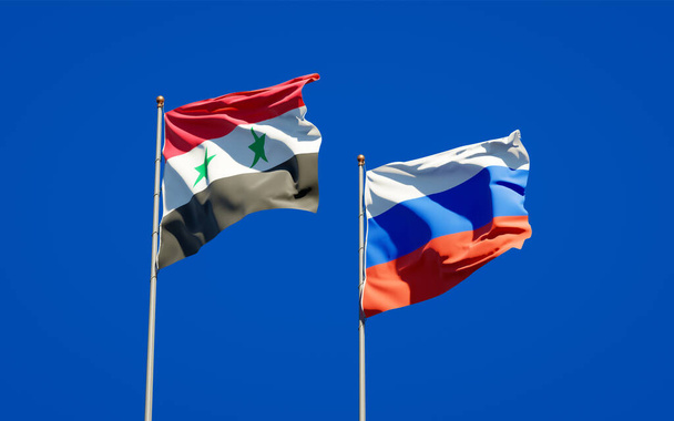 Szíriának és Oroszországnak gyönyörű nemzeti zászlói vannak az égbolton. 3D-s művészeti koncepció.  - Fotó, kép