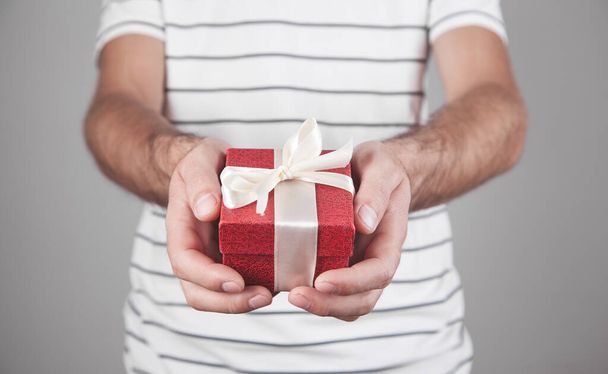 Man with gift box. Christmas. Surprise - Foto, Bild