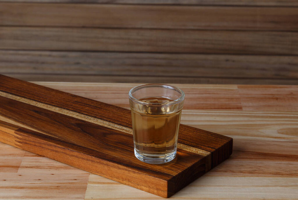 Cup of Cachaca or Pinga, a traditional Brazilian drink made from sugar cane. - 写真・画像