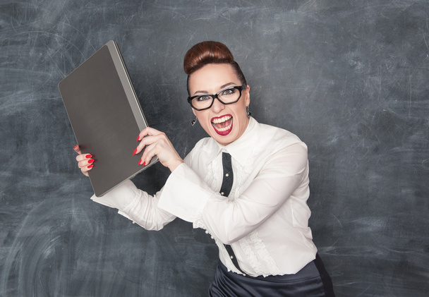Angry business woman with laptop - Photo, Image
