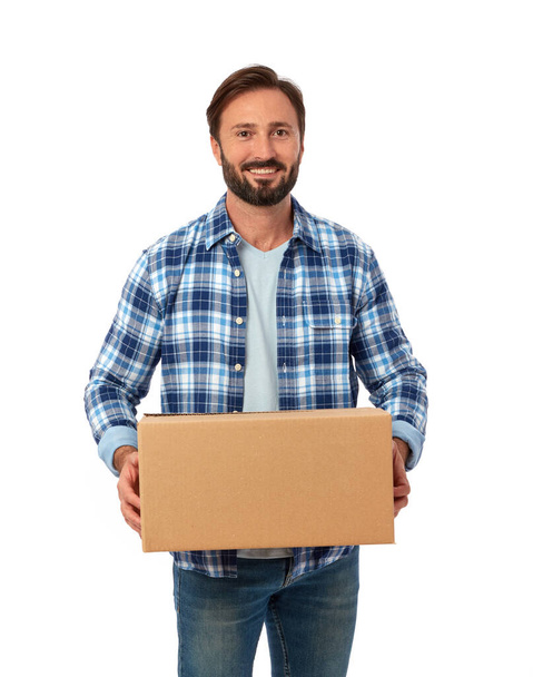 Delivery guy with cardboard box on white background - Φωτογραφία, εικόνα