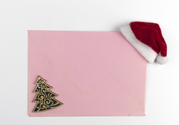 Envelope with Christmas decoration on white background. Christmas and New Year concept - Photo, Image
