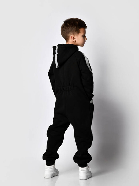 Fashion boy posing in sport tracksuit and snickers - Fotografie, Obrázek