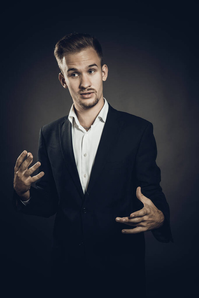 Young man dressed in suit studio portrait - Zdjęcie, obraz