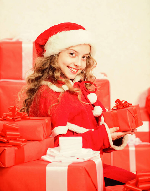 Unpacking christmas gift. Happy new year concept. Winter holiday tradition. Girl celebrate christmas open gift box. Opening christmas gift. Kid happy with christmas present. Santa bring her gift - Φωτογραφία, εικόνα