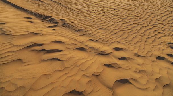 Zamknij piasek tekstury piaszczyste tło piękno w przyrodzie - Zdjęcie, obraz