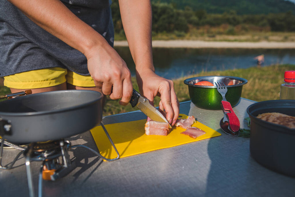 cooking food at fresh air. camping concept. lifestyle concept - Fotoğraf, Görsel