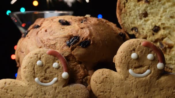 Close up on panettone and gingerbread men. - Footage, Video