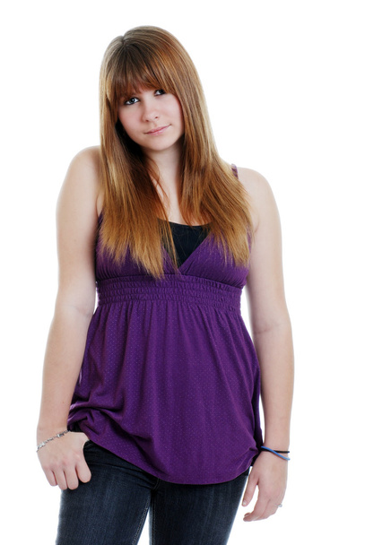 Shy teenager wearing a purple top and black jeans - Фото, изображение