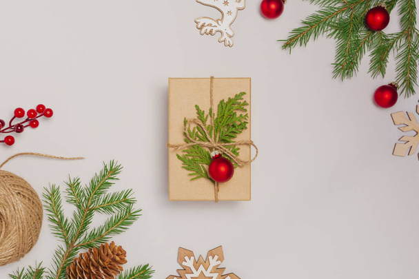 Rustic white background with Christmas present - Φωτογραφία, εικόνα