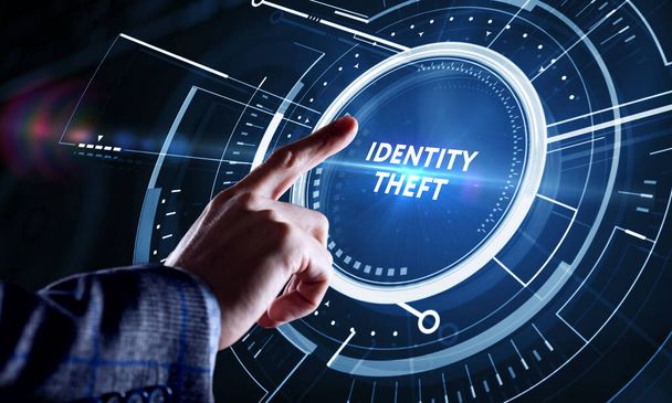Business, Technology, Internet and network concept. Young businessman working on a virtual screen of the future and sees the inscription: identity theft - Photo, Image