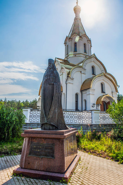 Monument to Seraphim Smolensky (Ostroumov) at the Church of the Resurrection of Christ. The village of Katyn, Smolensk region. Russia.Date of filming July 11, 2020 - Foto, immagini