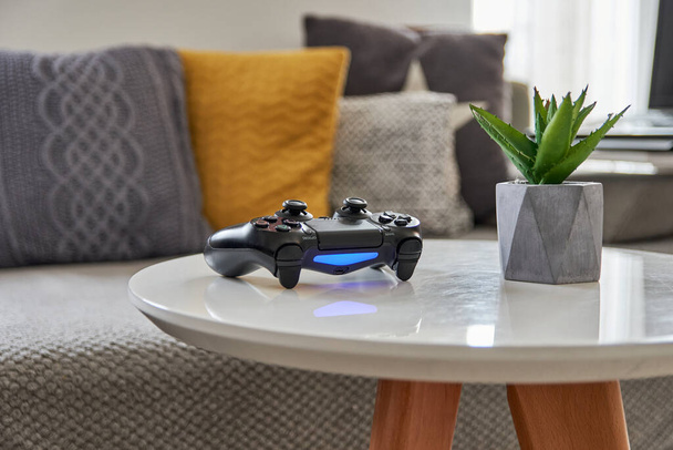 A closeup shot of a joystick on a table at home - Фото, зображення