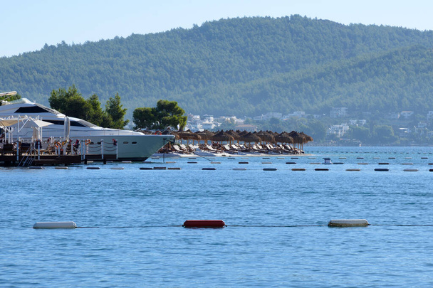 Turkey, Bodrum, October 2020. Beautiful seascape. Sea, mountains, yachts and buoys. Rest in Turkey. - Fotó, kép