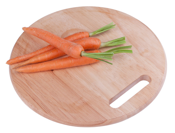 Carrots on a chopping board - Photo, Image