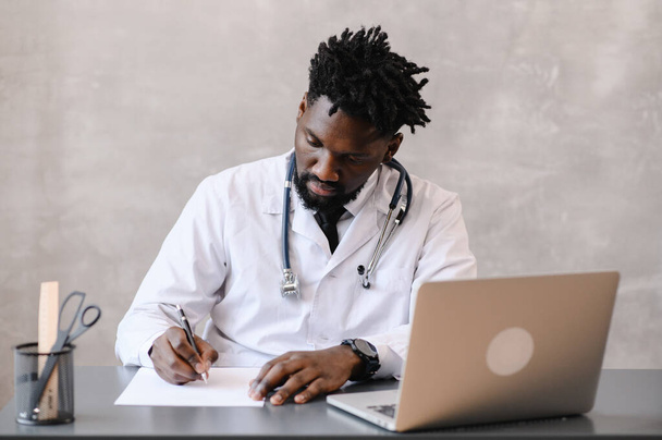 telehealth with virtual doctor appointment and online therapy session. Black doctor online conference  - Фото, изображение
