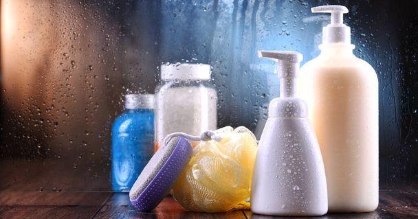Different containers of body care products in the bathroom. - Photo, Image