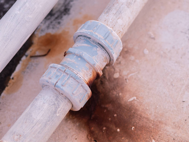 Damaged valves, pipes, and plumbing pipes, and lots of rusting, causing frequent water leaks. - Photo, Image