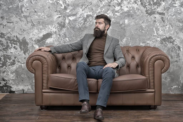Being himself being authentic. Man of business. Elegant business man relaxing on sofa. Confident business coach. Bearded man in casual business wear - Valokuva, kuva