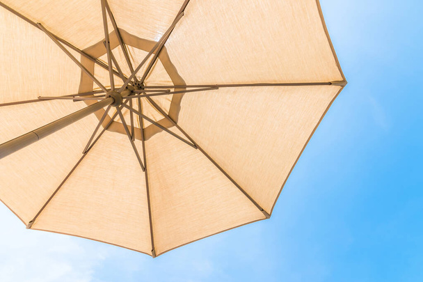 Summer background beach umbrella sunshade uv protection - Фото, изображение