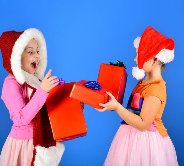 Partying and holiday concept. Children with surprised faces - Фото, изображение
