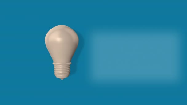4k video of transparent realistic glowing light bulb isolated on blue. - Footage, Video