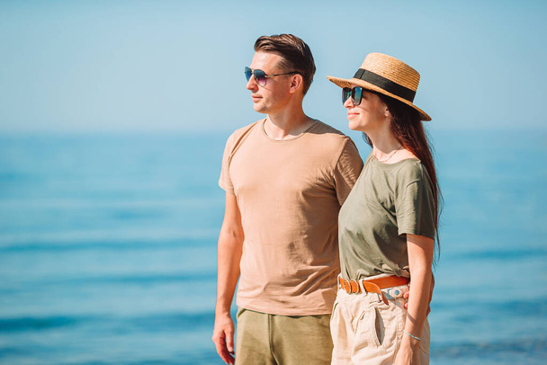 Young couple on white beach during summer vacation. - Valokuva, kuva
