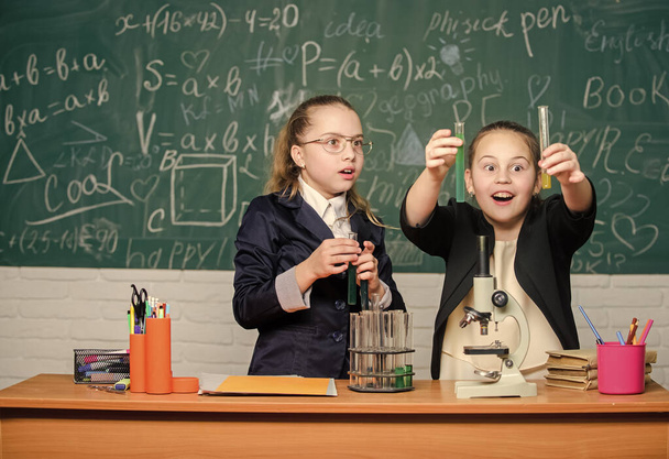 Biology lab. Breathing life into chemistry. science experiments in laboratory. Little girls genius in school lab. Science lab. Little girls scientist with microscope. Chemistry research in laboratory - Photo, image