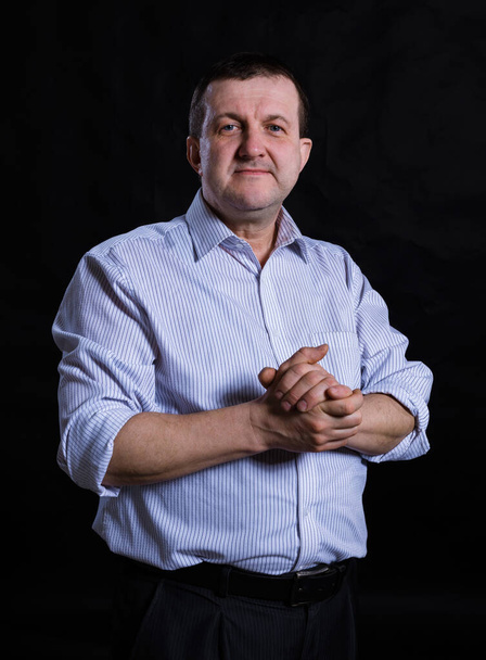 Middle aged solid man dressed in shirt studio portrait - Φωτογραφία, εικόνα