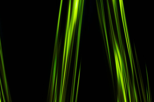 Green light lines on a black background - Foto, Imagen