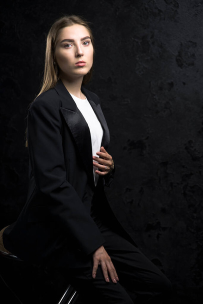 Young fashion woman model posing in stylish clothes. - Valokuva, kuva