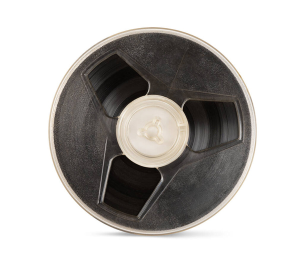 Vintage old magnetic audio tape reel isolated on white background with clipping path - Foto, afbeelding