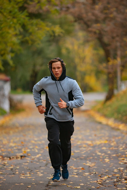 Man jogging in a park - Photo, Image