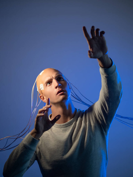 Bald man with electrodes in his brain , futuristic concept, - Zdjęcie, obraz