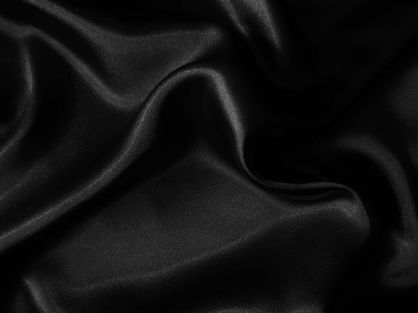 Black crumpled fabric background.. Liquid wavy shape. - Foto, Imagem