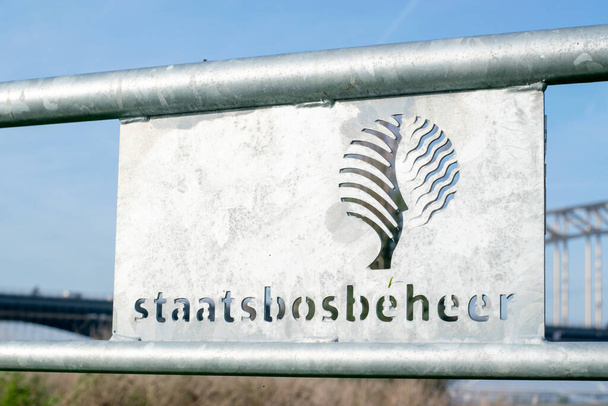 A Metal staatsbosbeheer sign standing in the Nature - Photo, Image