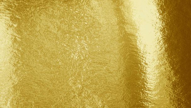 Fondo de lámina dorada con reflejos y textura desigual - Foto, Imagen