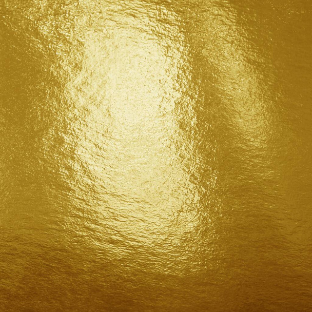 Gouden folie achtergrond met hoogtepunten en oneffen textuur  - Foto, afbeelding